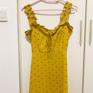 reformation style mustard polka dot mini dress